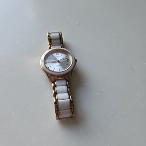 Gold and White Watch